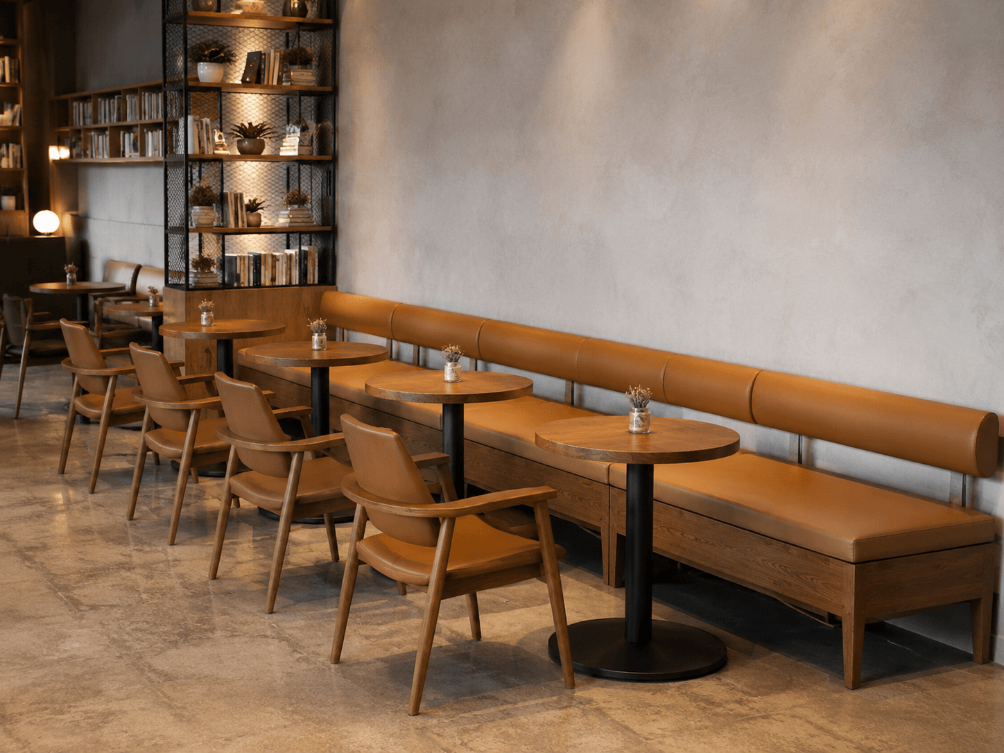 Wall-side seating arrangement for a hospitality space